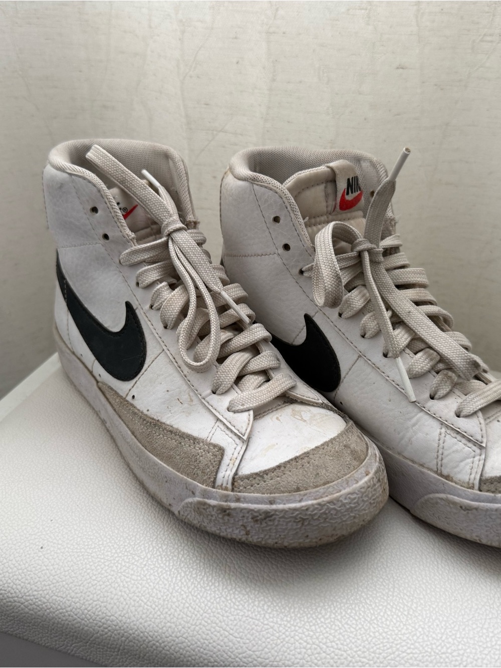 Nike Men’s White High-Top Sneakers with Black Swoosh and Red Tongue Logo